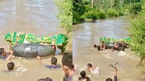 Viral Video Warga Bawa Jenazah Pakai Ban Karet Seberangi Sungai Di