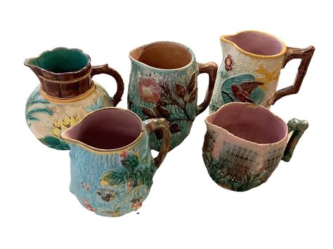 Lot 5 Early Majolica Pottery Pitchers Tallest 8”h Shortest 5”h All