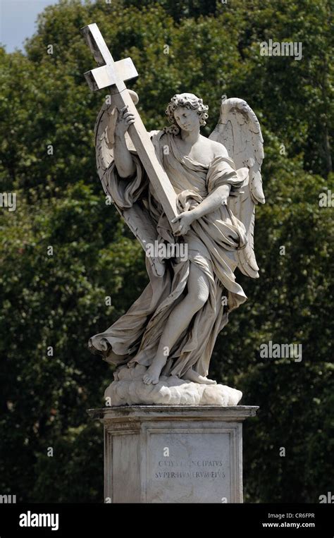 Statue Of An Angel Holding A Cross On Ponte Sant Angelo Bridge Aelian