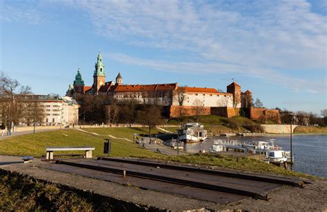 Royal Castle near River in Krakow · Free Stock Photo