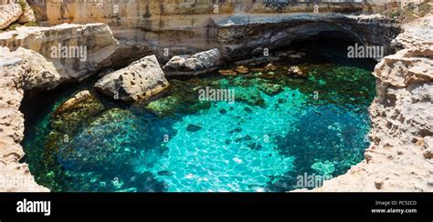 Picturesque Seascape With White Rocky Cliffs Caves Sea Bay And Islets