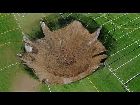 Massive Sinkhole Swallows Up Illinois Soccer Field YouTube