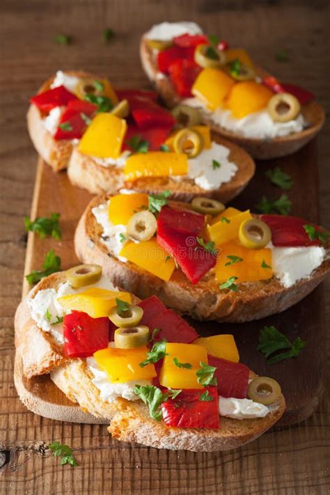 Italian Bruschetta With Roasted Peppers Goat Cheese Olives Stock Image