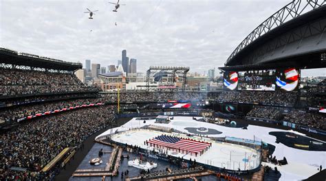 Kraken Walk Out To Nhl Winter Classic As Fish Are Tossed In Very