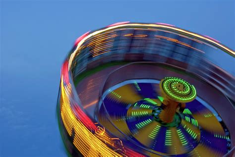 Multicolored Spinning Carnival Ride Photograph By By Ken Ilio Fine