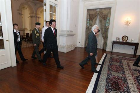 President Tony Tan And His Wife Mrs Mary Tan Walking Out Of