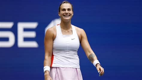 Download Aryna Sabalenka Professional Tennis Player With Winning Smile Wallpaper