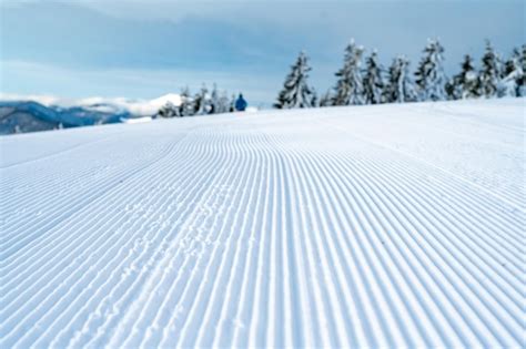 Premium Photo | Fresh tracks of snowcat at the ski resort slopes