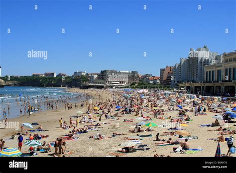 Lovely beach of Biarritz in France with the famous Hotel du Palais at ...