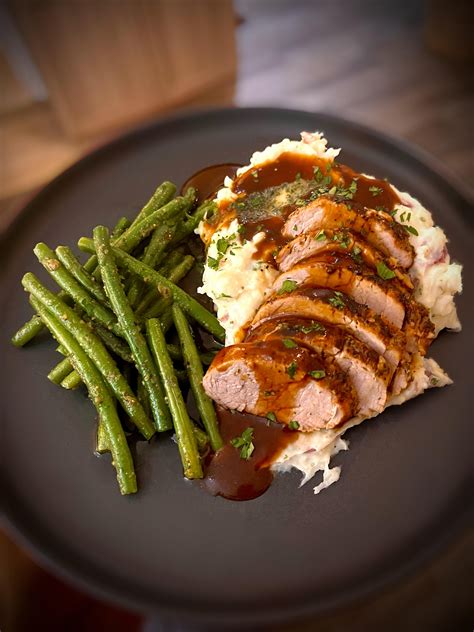 [oc] Pork Tenderloin With Au Jus Cheesy Roasted Garlic Skin On Mashed Potatoes And Green Beans