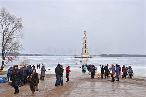 Kalyazin, Russia, March, 02, 2014. People Walking Near the Bell Tower ...