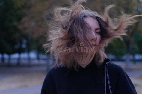 Serious Look Of Girl With Windy Hair At Dark Street Stock Image Image