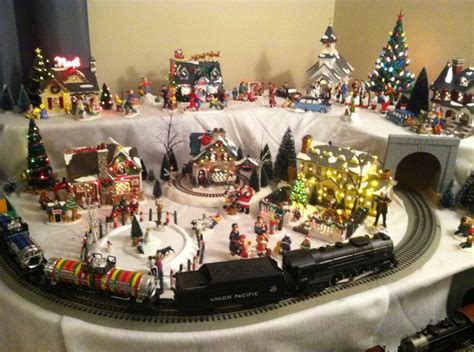 2015 Dept 56 Snow Village And Lionel Train Layout Around The Christmas