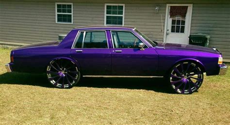 Purple 1990 Chevy Caprice Classic Car with Black Rims