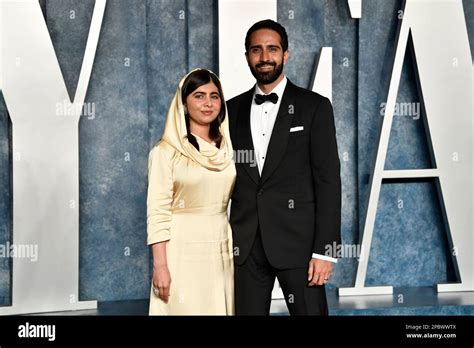 Malala Yousafzai Left And Asser Malik Arrive At The Vanity Fair Oscar