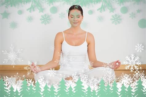 Premium Photo Smiling Brunette Sitting In Lotus Pose Looking At