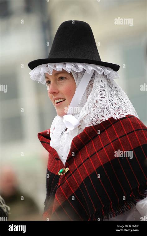 A Young Woman Dressed In Traditional Costume At The Welsh Lady Stock