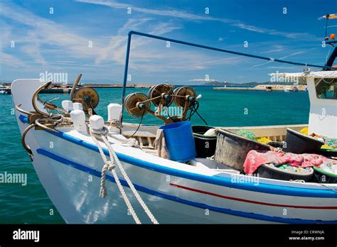 Traditional Small Greek Fishing Boat In A Harbor Stock Photo Alamy