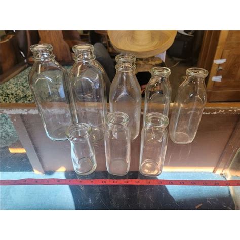 8 Milk Bottles Various Sizes Schmalz Auctions