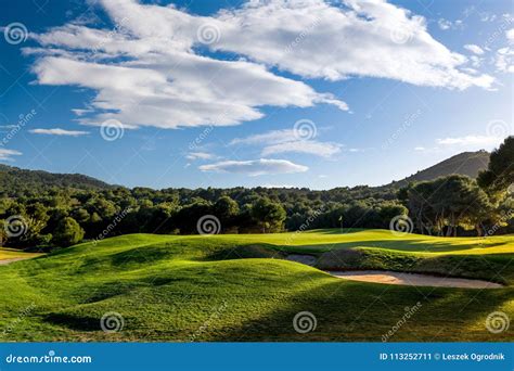 Sunset Golf Course With Trees Blue Sky And Clouds Stock Image Image