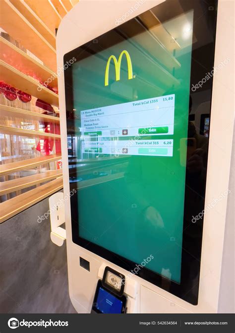 New Mcdonalds self order kiosk fast food with POS system printer – Stock Editorial Photo ...