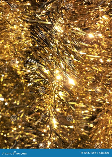 Christmas Gold tinsel stock image. Image of backgrounds - 106171659