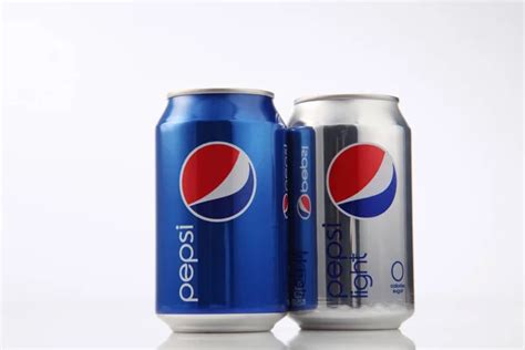 Cans of Pepsi cola – Stock Editorial Photo © eskaylim #81883156