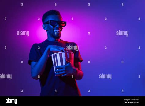 Excited In 3d Eyewear And With Popcorn African American Mans Portrait