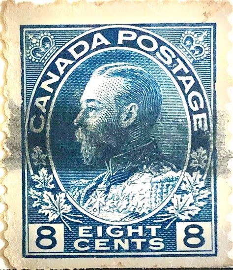 an old postage stamp with a man's face