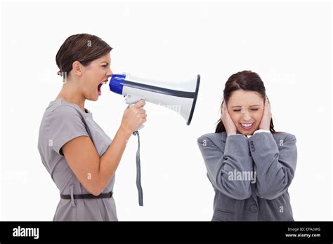 Businesswoman Yelling At Colleague With Megaphone Stock Photo Alamy