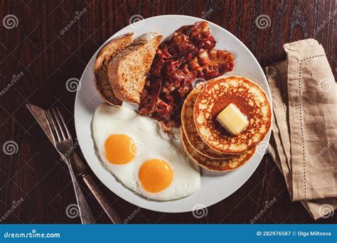 Traditional Full American Breakfast Eggs Pancakes With Bacon And Toast