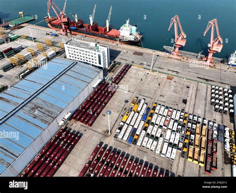 LIANYUNGANG, CHINA - JANUARY 11, 2022 - A view of cargo loading and ...