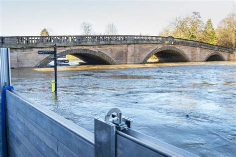 Bewdley Flood Barriers And High River Levels Submerging A Signpost Next