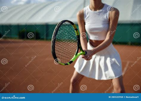 Closeup View On Female Tennis Player Holding Racket Stock Photo Image