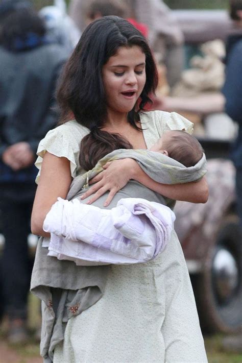 Playing Mommy! Selena Gomez Holds Baby On Set Of New Film In Dubious Battle