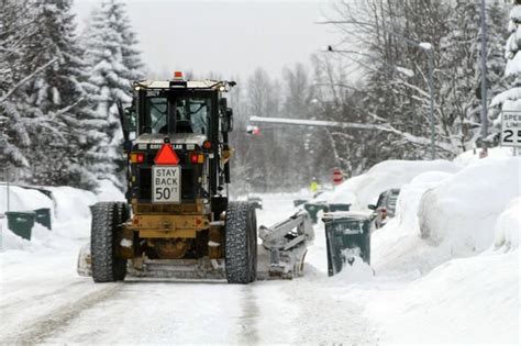 Alaska Snow Rescuers Struggle To See As Roofs Collapse After Record