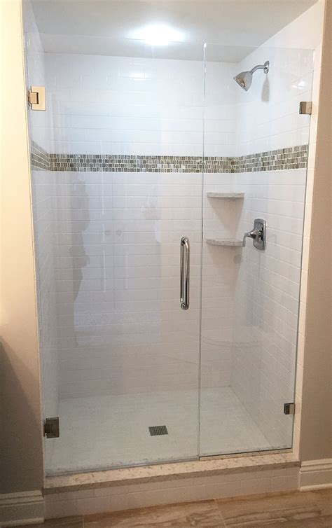 Frameless Shower Enclosure Door Panel With Wall Mounted Clips Furnished And Installed By Rex