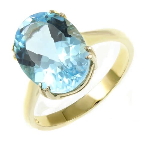 Ct Yellow Gold X Mm Oval Blue Topaz Ring Jewellery From Mr Harold