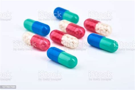 약 약입니다 정제입니다 Capsulepharmaceutical의 약 파란색의 더미의 클로즈업 흰색 노란색 및 녹색 정제캡슐 알