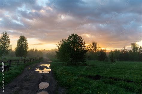 Rural landscape with a dirt road Stock Photo | Adobe Stock