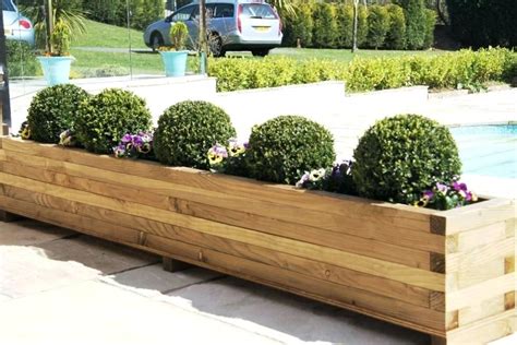 Diy Planter Box S S Build Planter Box Along Fence Diy Planter Box Bench