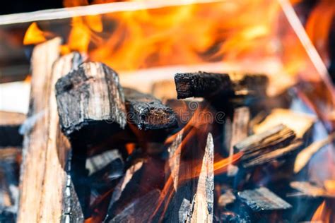 Barbecue Grill Pit With Glowing And Flaming Hot Open Fire With Red