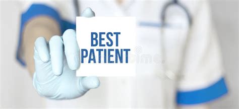 Doctor Holding A Paper Plate With Text Best Patient Medical Concept