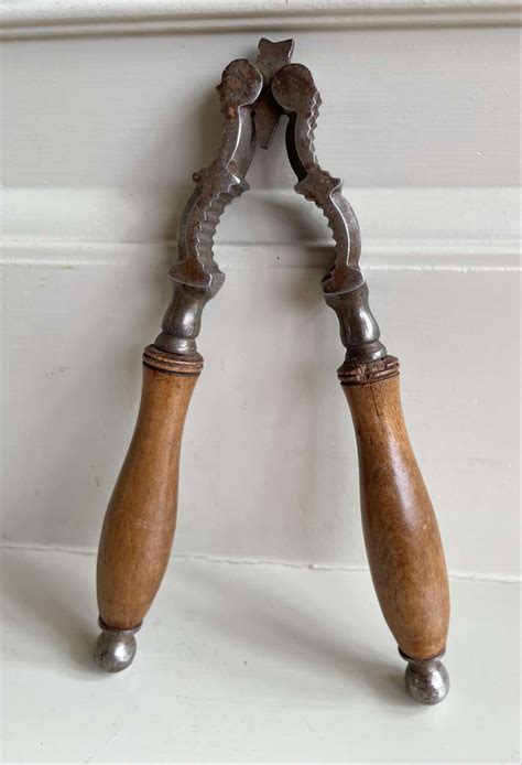 Antique Steel And Treen Nutcrackers