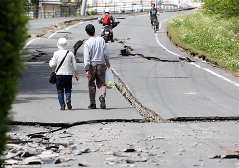 Japan Earthquake Rescuers In Race To Beat Storm After 41 People Are