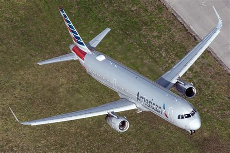 American Airlines Flight Diverts After Passenger Tries To Open Door