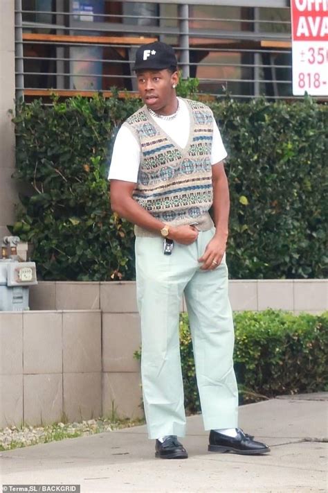 Tyler The Creator Looks Relaxed In Beige Sweater Vest And Mint Slacks