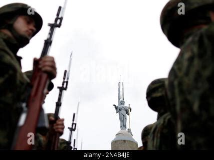 A Serbian Military Honor Guard Pay Homage To The Victims Of The