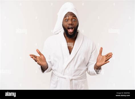 Portrait Of Excited Young African American Male Screaming In Shock And