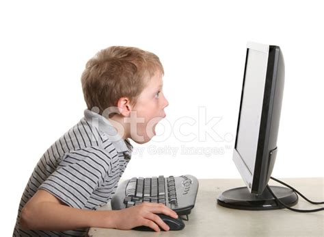 Surprised Boy Looking At Computer Stock Photo Royalty Free Freeimages